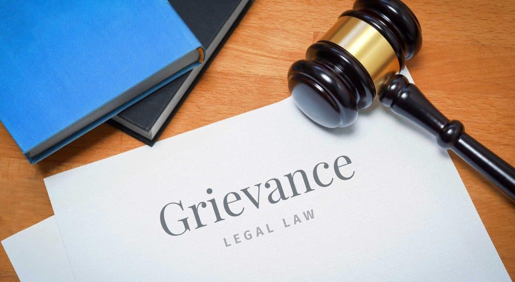 paper with Grievance written